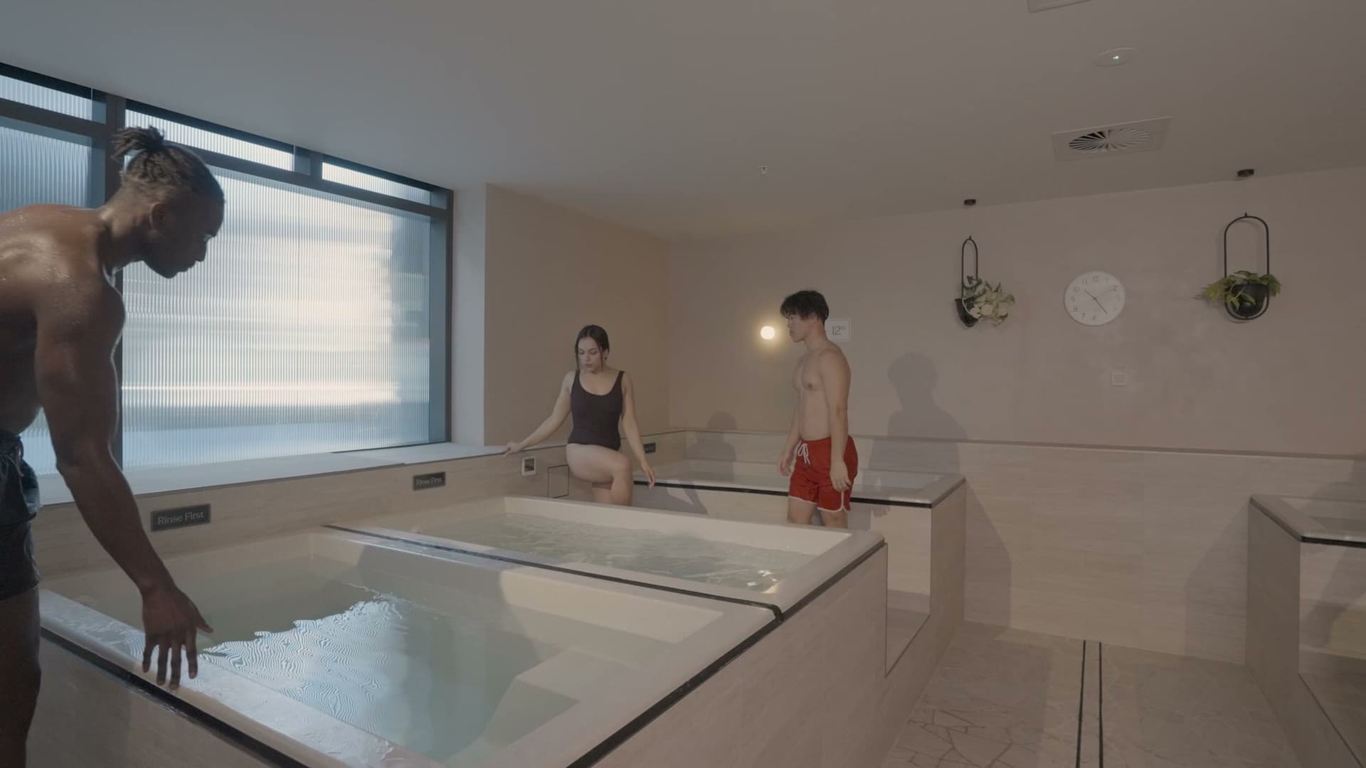 Steam rising off an ice bath as someone lowers in